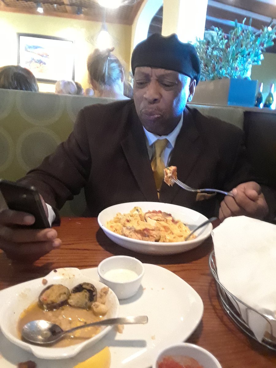 milwalker64's tweet image. He held that phone through the entire meal...