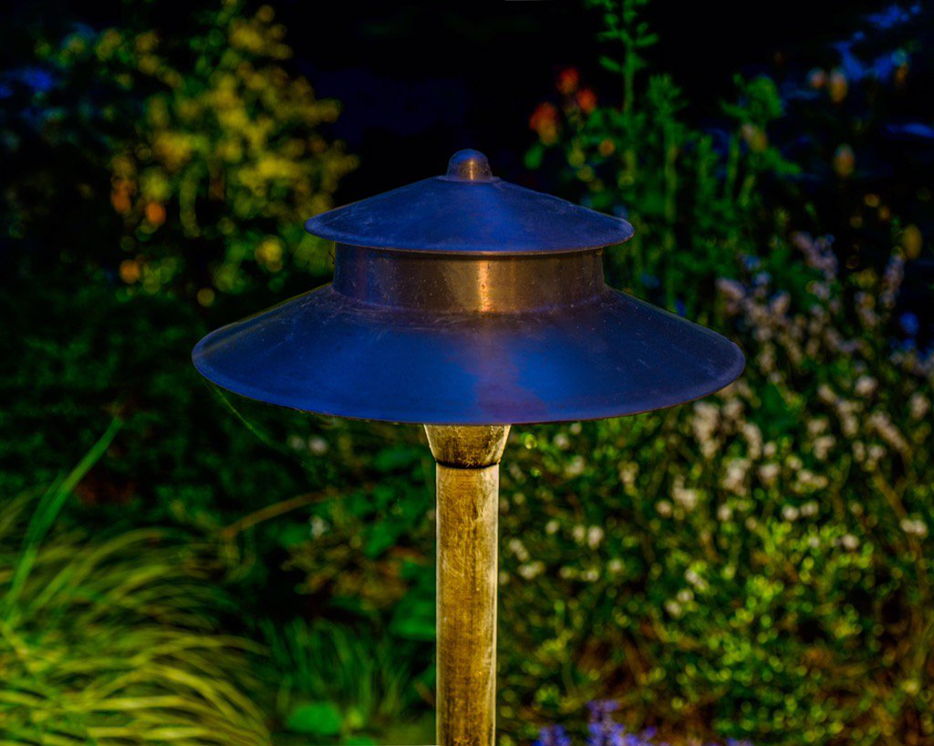 Our Brass Villa pathlight stands tall and proud, greeting all who come its way. #nwoutdoorlighting #pathlight