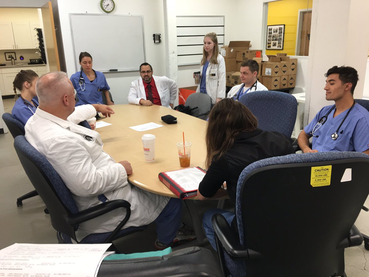 Program Director Amrien guides clinical and didactic year students at CEHC during student run diabetes clinic, a truly rewarding experience.