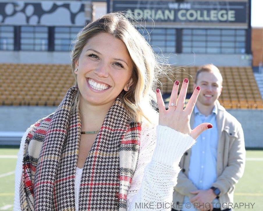 AdrianWSoccer's tweet photo. Congrats to former ACWS forward Carmina Lizyness ‘14 on her engagement on campus during homecoming! @cmlizy https://t.co/MCQ2cfo3r3