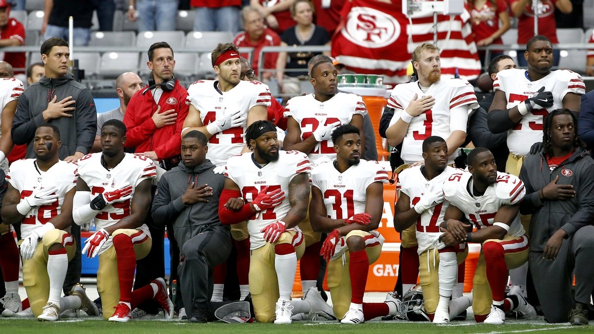 Half of San Francisco 49ers players kneel during anthem
