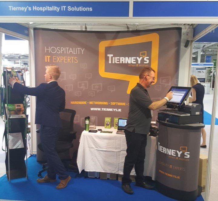 Tierneys_IT's tweet photo. @RestaurantShow is open!  Louis and Trevor adding finishing touches to our stand US11 #TRS2017. #Hospitality #AlohaPOS #Orderman #ITExperts https://t.co/3975Je5MRI