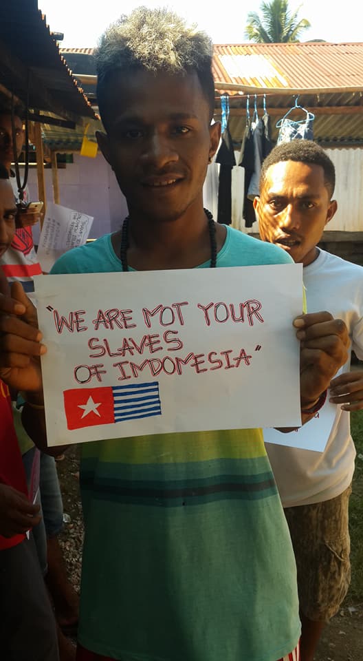 BennyWenda's tweet photo. The message from the youth of #WestPapua is clear: "We are NOT your slaves of #Indonesia" https://t.co/GRCcdkSIpx  #ULMWP #FreeWestPapua https://t.co/4qn4OqItMN