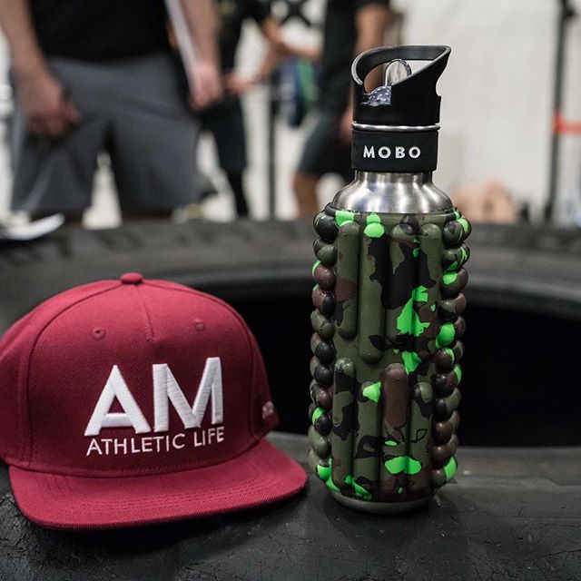 The AM Snap Back &amp; Camo Green Mobo bottle making an appearance at the Turf Games this week. Shop both online at theactiveman.com