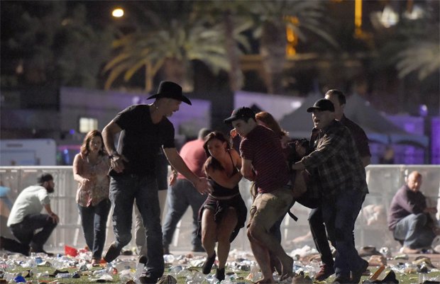 UPDATE:'Beyond horrific': Shooting on Las Vegas Strip kills at least 50, wounds hundreds DLILwKGWAAAEI9M