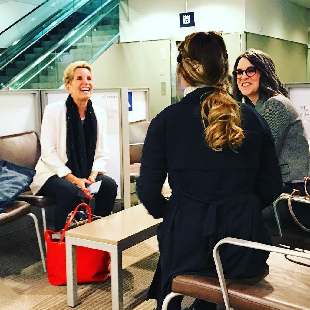 trulyinc's tweet photo. Early morning #teamtsi flight to YUL and we bump into @kathleen_wynne at YTZ. @nicpomeroy had no issue going right up to her to say hi! https://t.co/W12U019M6O