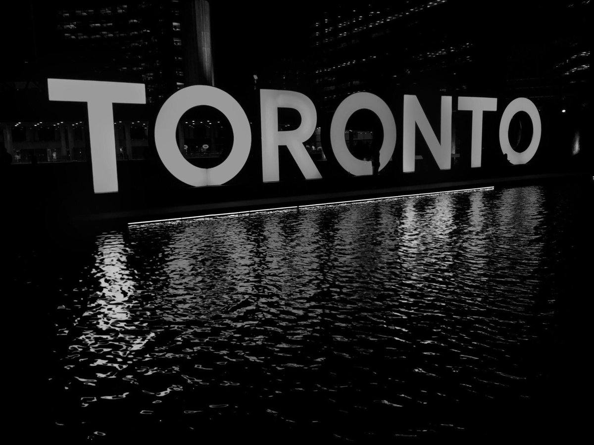 JohnTory's tweet photo. The Toronto sign will be dimmed tonight in respect for those who lost their lives or were injured in Las Vegas. Our thoughts are with our American brothers &amp; sisters. https://t.co/wDu1HpUMoh