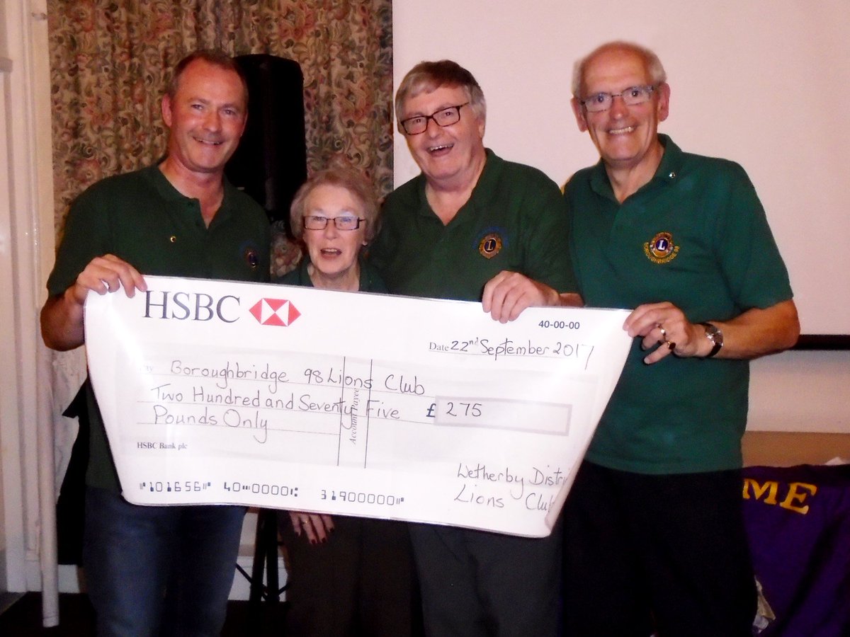 Lion President John, with cheque presented by Wetherby Lions in recognition of support given to Great Yorkshire Cycle Ride