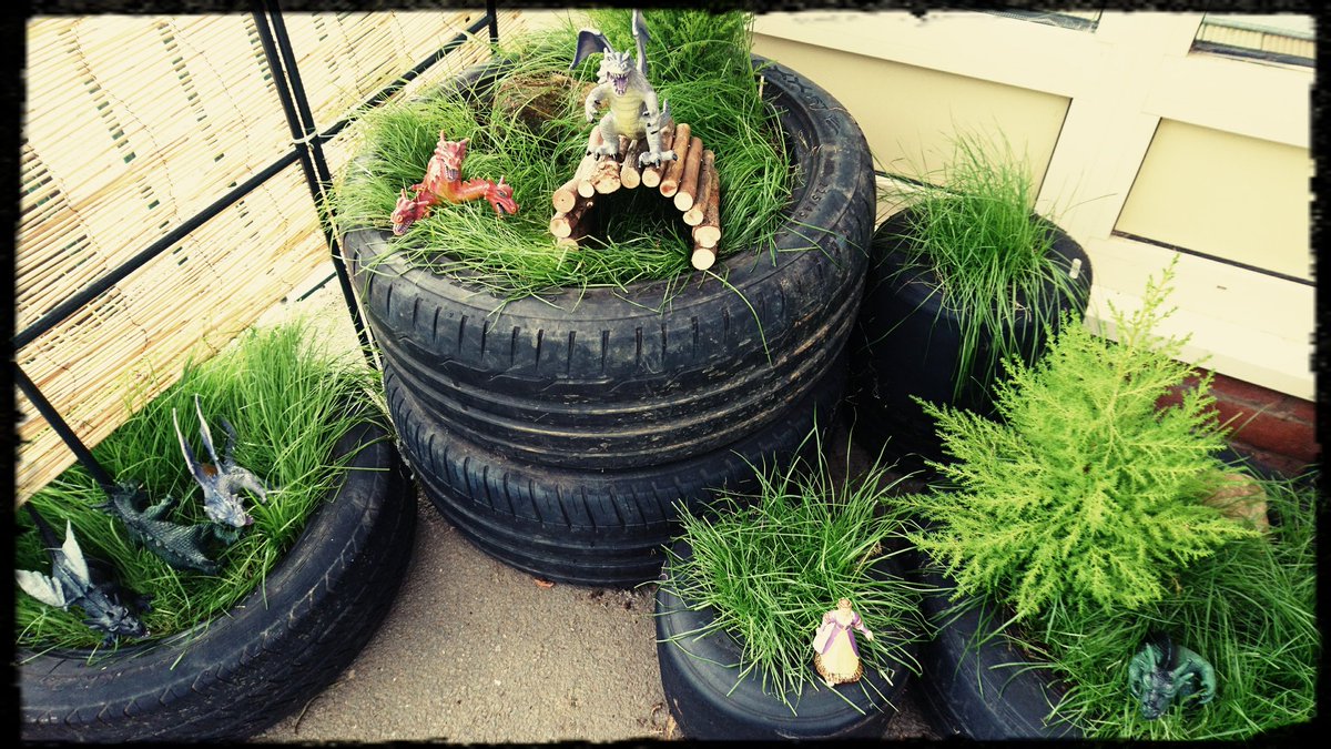 LadyBirdsHan's tweet photo. Our outdoor "small world" area! 🐲 dragons today! 🐲 https://t.co/6mjAm3iWFL