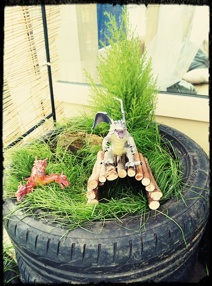 LadyBirdsHan's tweet photo. Our outdoor "small world" area! 🐲 dragons today! 🐲 https://t.co/6mjAm3iWFL