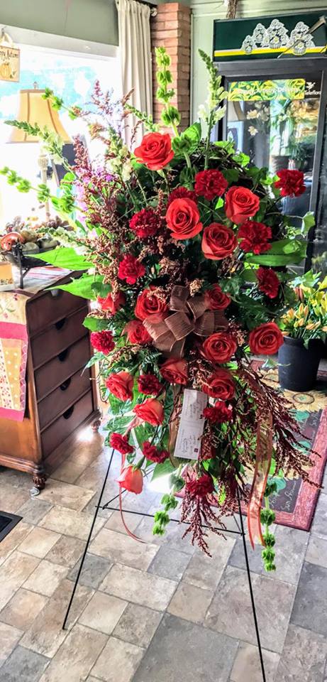 WHFlowershop's tweet photo. Check out this gorgeous wreath spray created at Whitehouse Flowers & Gifts! #whitehousetx #localflowershop #redroses https://t.co/c5XMFsk1pl