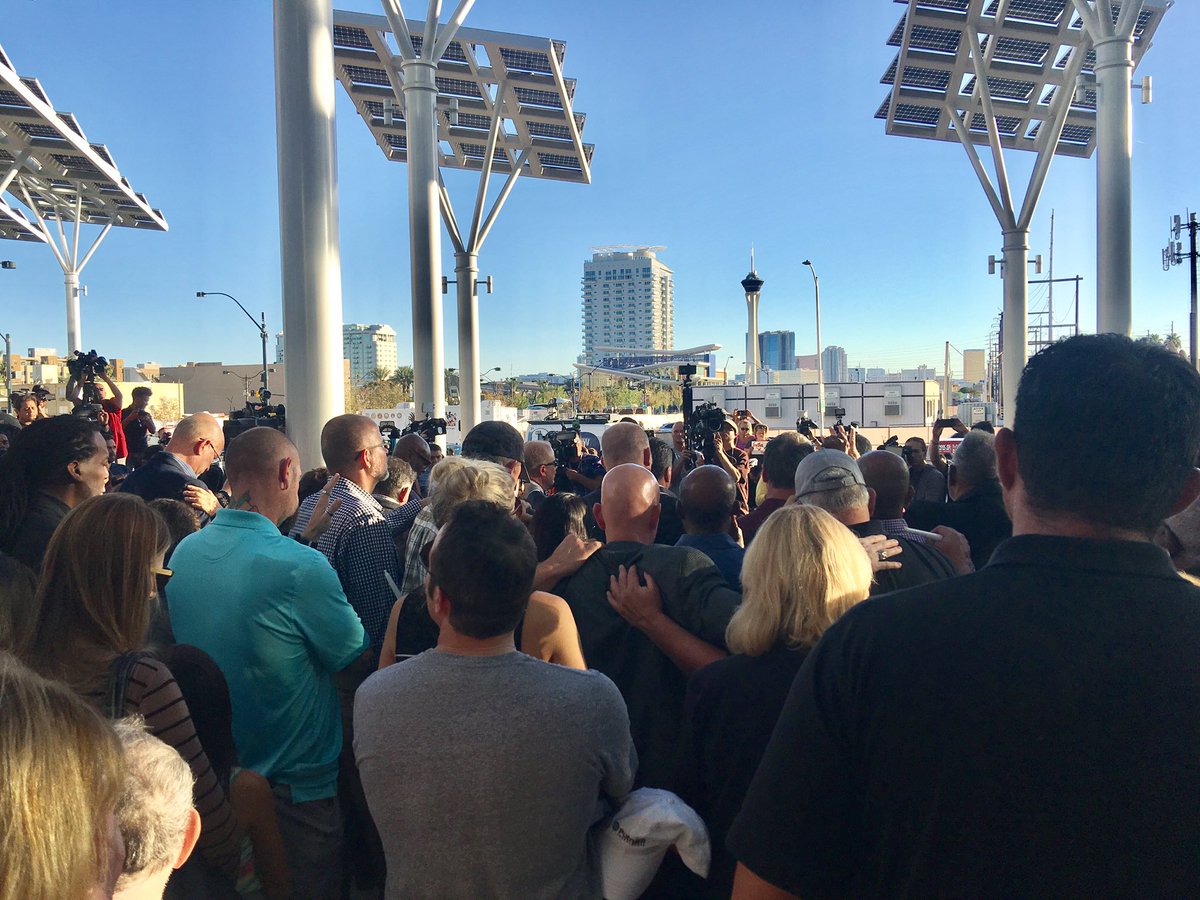Thompson4AD17's tweet photo. "Evil showed it's face last night, but Love showed its face this morning!"-prayer @CityOfLasVegas Prayer Vigil #prayforlv #pray4families https://t.co/cn8yXjkVou