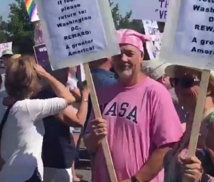 Is this Stephen Paddock in Reno at anti-Trump event with pussy hat?