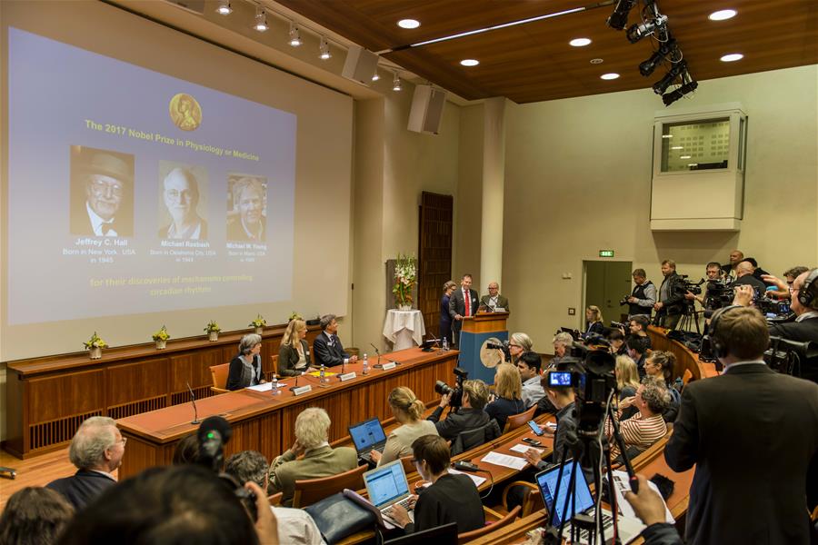 ChinaDaily's tweet photo. Three US scientists won the Nobel Prize in physiology or medicine for being "able to peek inside biological clock".https://t.co/E4EIrl6tcK https://t.co/2EA292U2ac