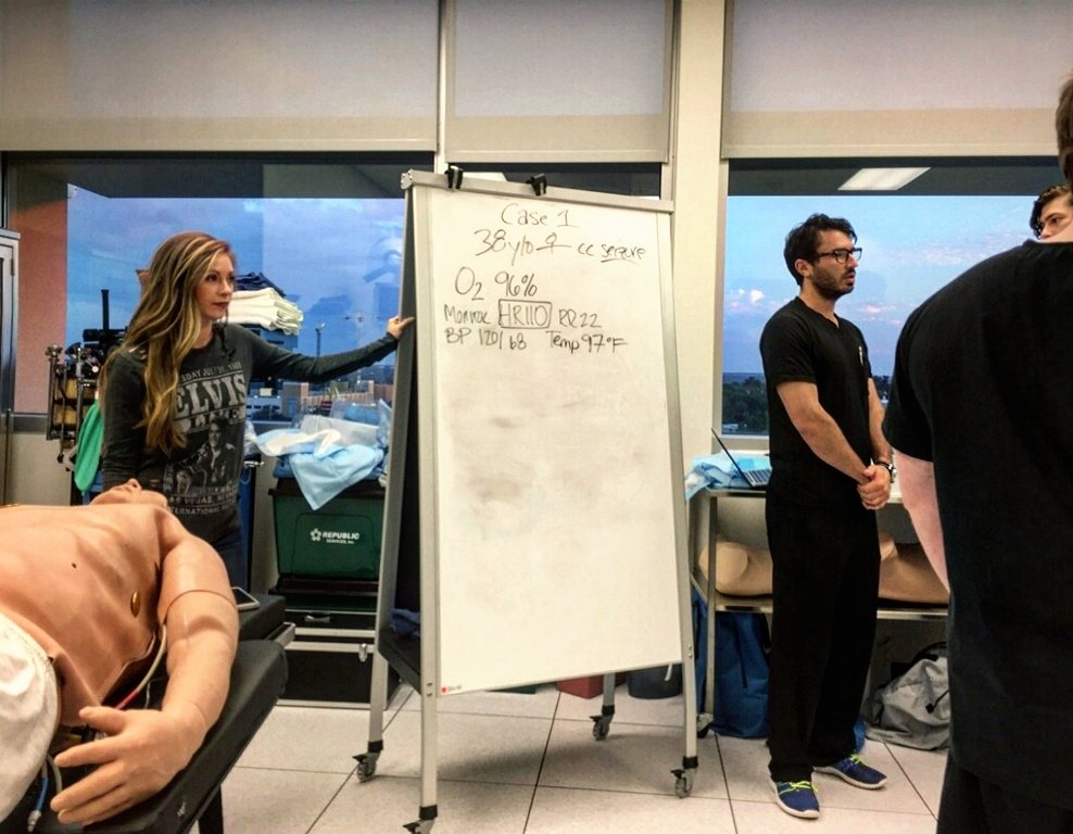AmandaPientka's tweet photo. My co-residents &amp; I are always excited to spend time w budding docs. Tonight's sim? neuro emergencies. Love this group! @JPS_EMRes @TCOMEMIG https://t.co/gVKUtsXFhs