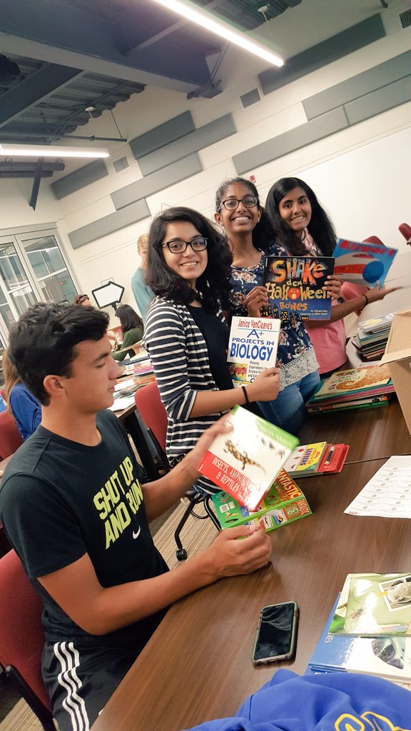HolaChurchLady's tweet photo. @friscointeract labeling books to give away at Fire Safety Town Halloween on Oct. 27th! @LebanonTrailHS https://t.co/t6oermzleO