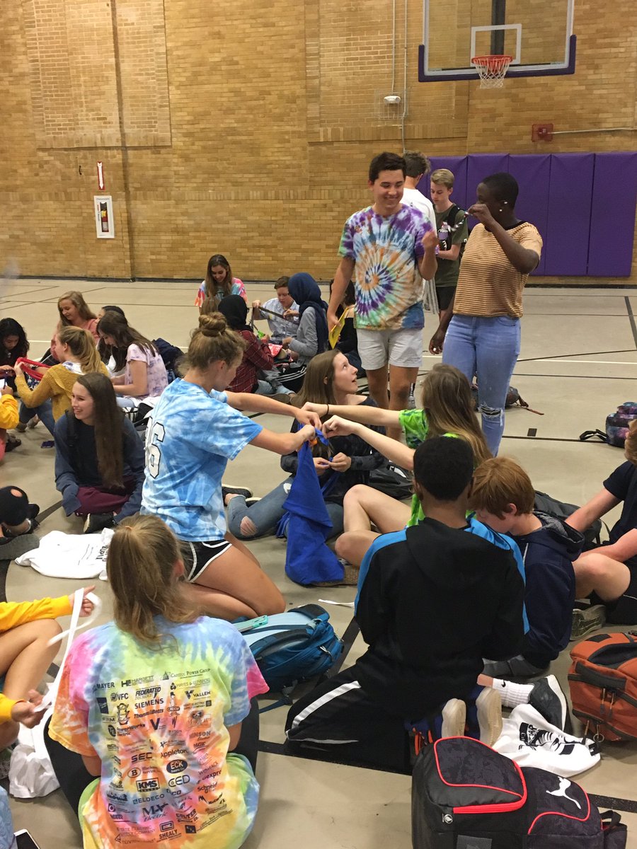 KWilliamsonBHS's tweet photo. The BHS Key Club is hard at work making dog toys out of old t-shirts! @NBroughtonHS @BHSCaps https://t.co/Tk0Fha0Fd6