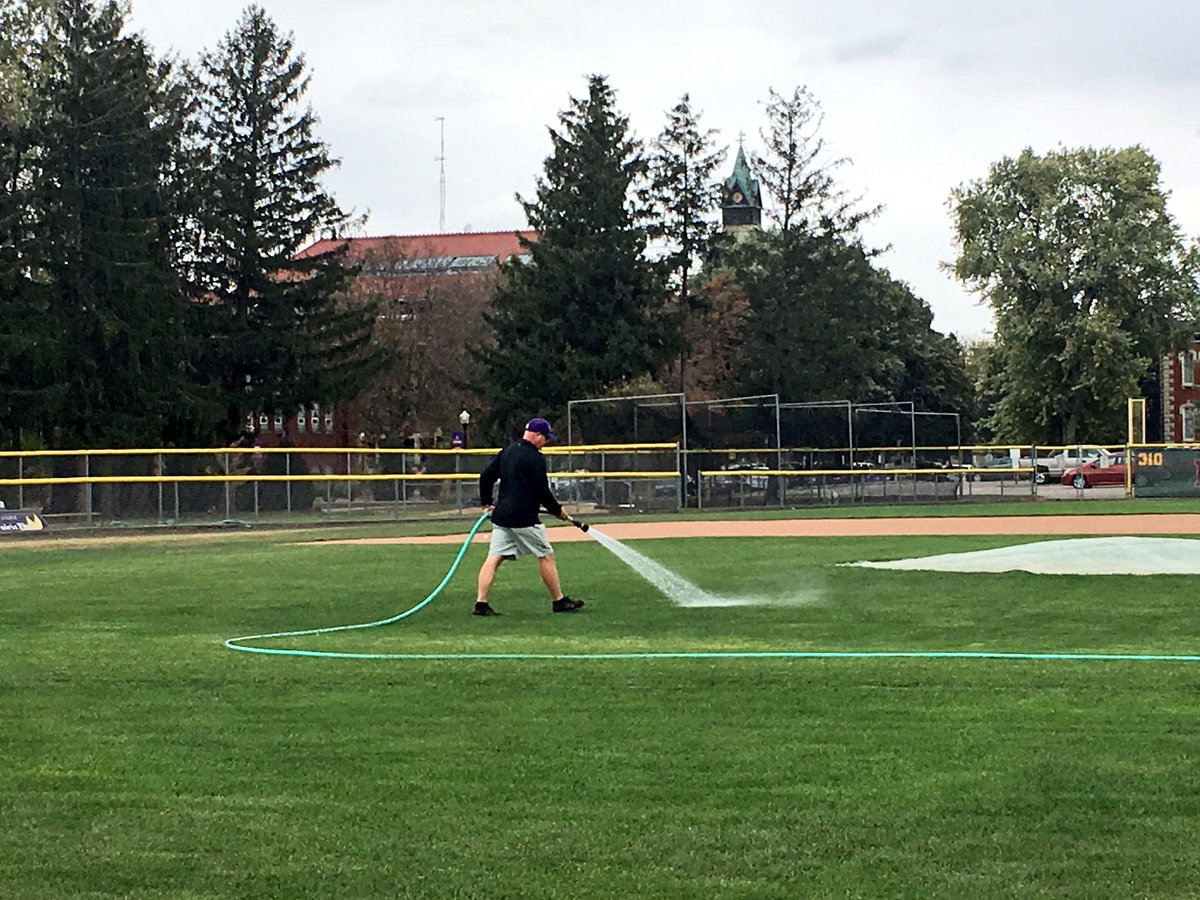 matthewlwheaton's tweet photo. Knox College baseball coach Jami Isaccson waters the infield at Blodgett Field on Tuesday afternoon. #secretphoto #hesnotsocialmediafan https://t.co/5PctPosL5T