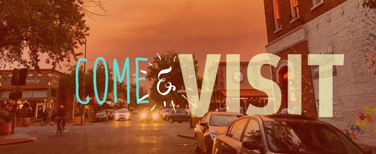 "Come and visit" superimposed over a dusk picture of downtown Chico.