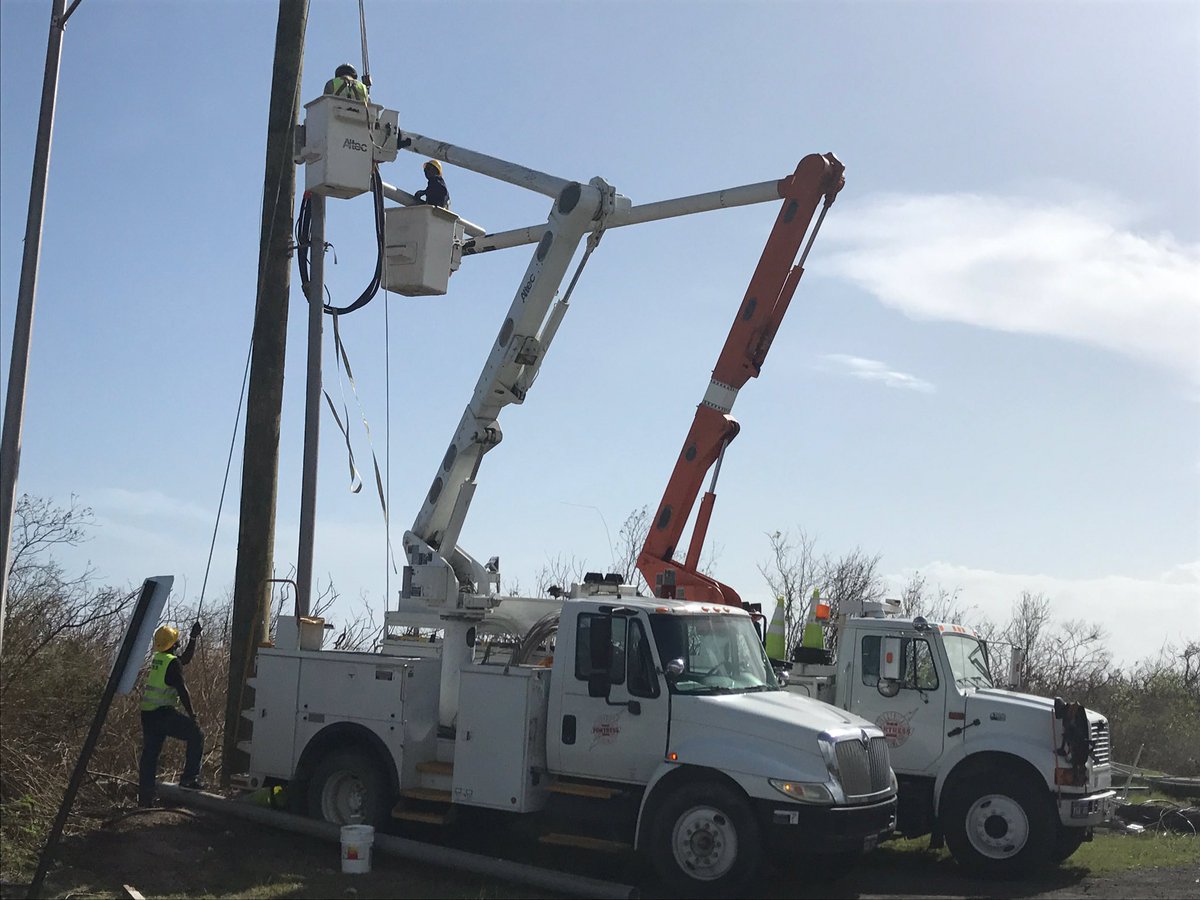 GreatBasinTeam5's tweet photo. #HurricaneMaria recovery efforts are starting on St. Croix. Utility companies fixing power poles and removing roadside debris. #USVI https://t.co/PvucYb9dxq
