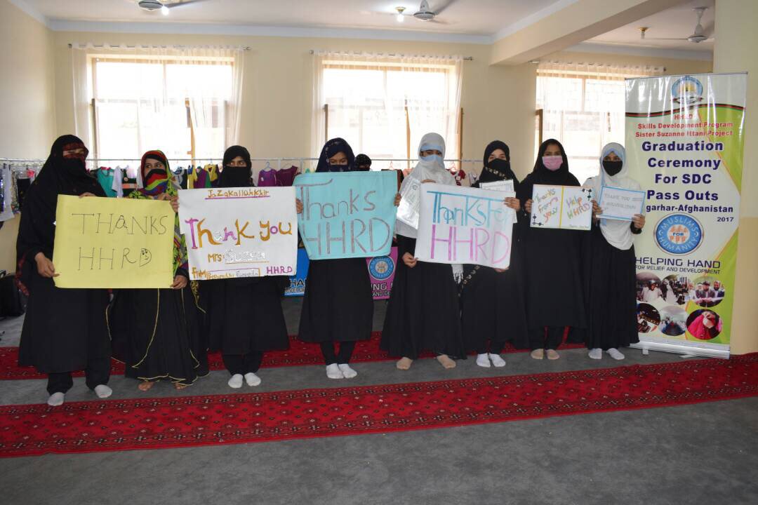 HelpingHandUSA's tweet photo. Students at our Skills Development Center in Afghanistan show their gratitude to our donors as they graduate #OneHomeOneSkill https://t.co/5JwIQrJgl8