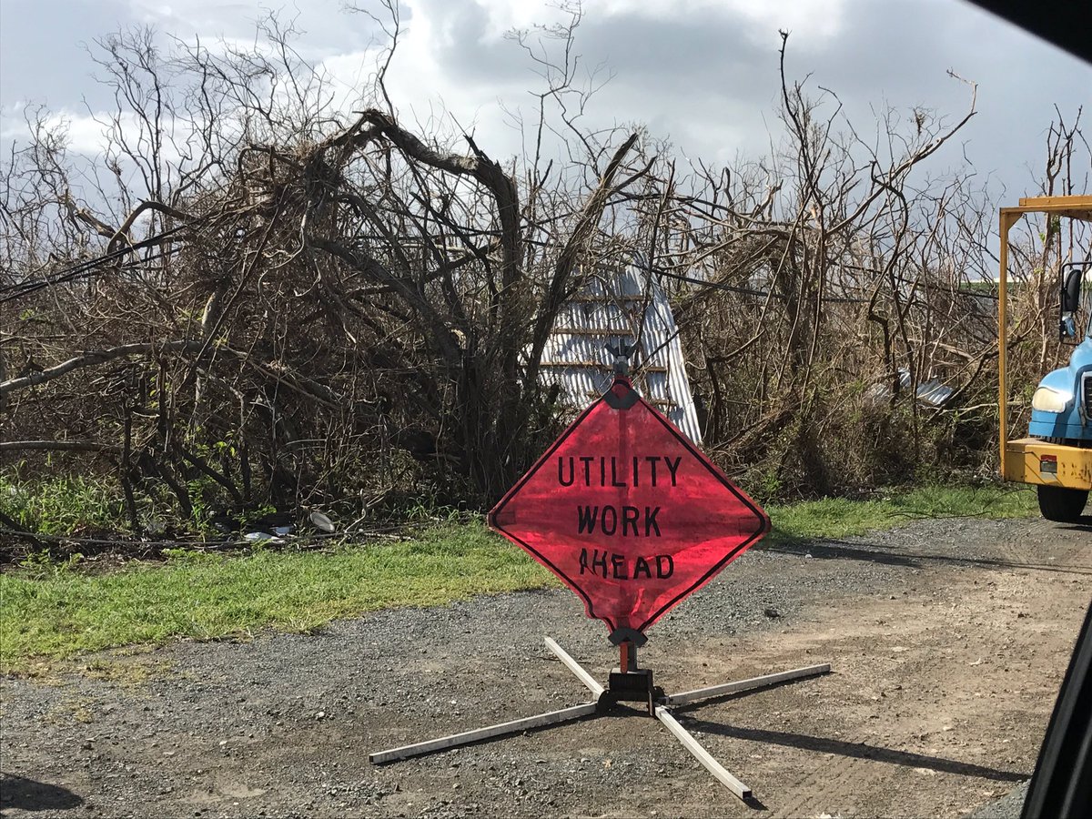 GreatBasinTeam5's tweet photo. #HurricaneMaria recovery efforts are starting on St. Croix. Utility companies fixing power poles and removing roadside debris. #USVI https://t.co/PvucYb9dxq