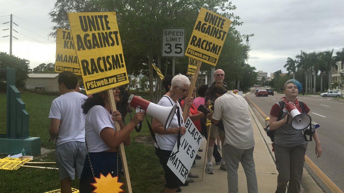 18 protesters and 2 non-protesters at school district