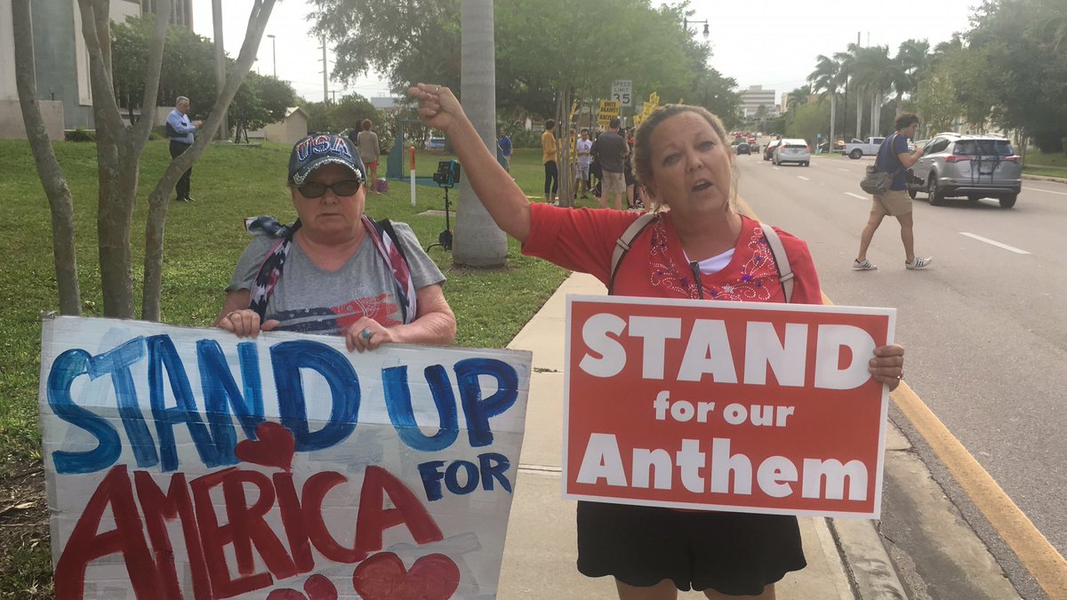 More than 20 protesters chanted, "Take a knee Manatee" on Manatee Ave...also 2 counter protestors, above, attended.