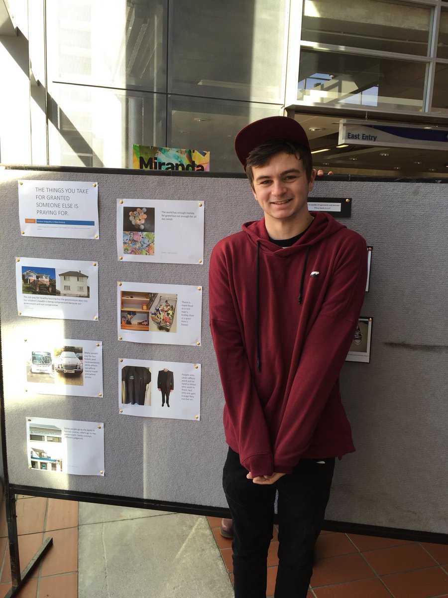 melanieberes's tweet photo. One of our lovely students next to his photo essay. Come check it out in the Link. #makinginequalityvisible @OtagoSGSW https://t.co/qGFPNscera