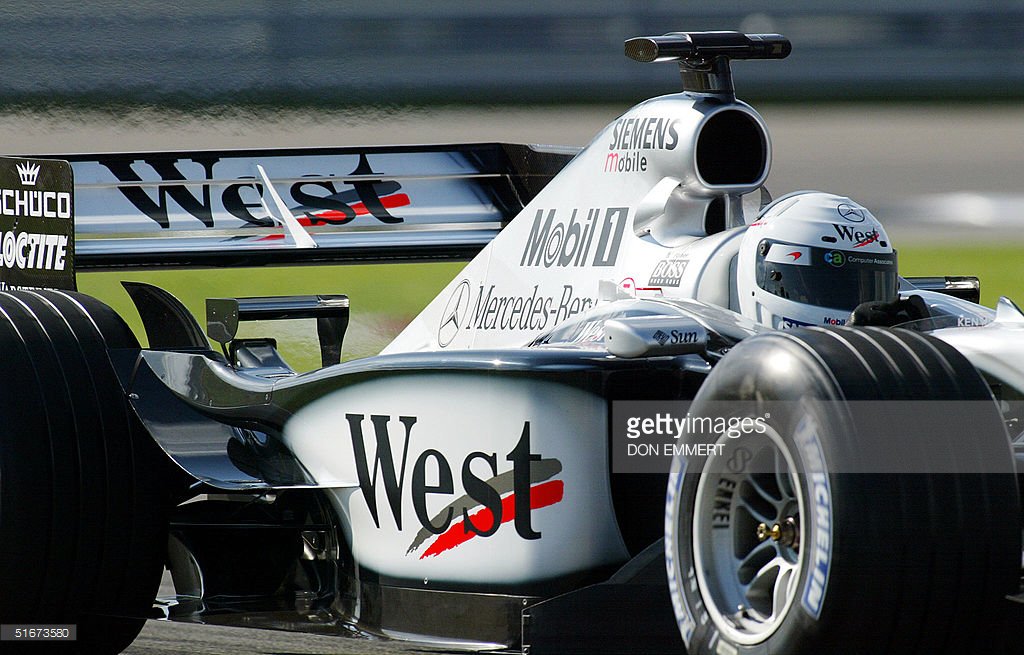 Happy Birthday Sarah Fisher!  (Demo run in a McLaren-Mercedes MP4-17 at Indianapolis, 2002) 