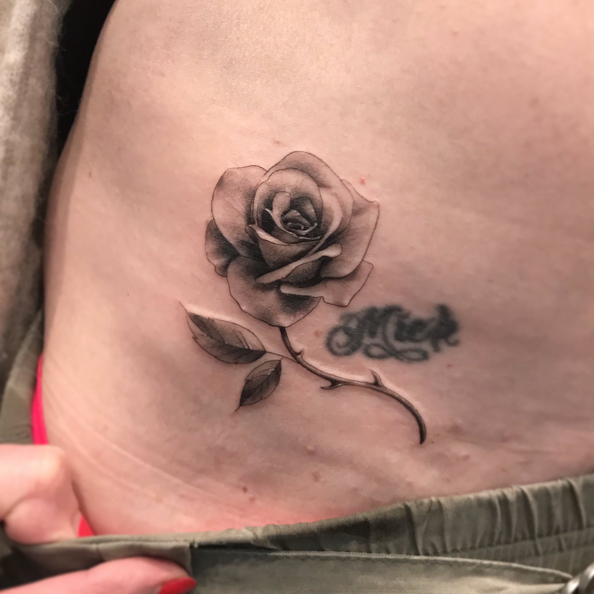 Black Rose Tattoo On Side