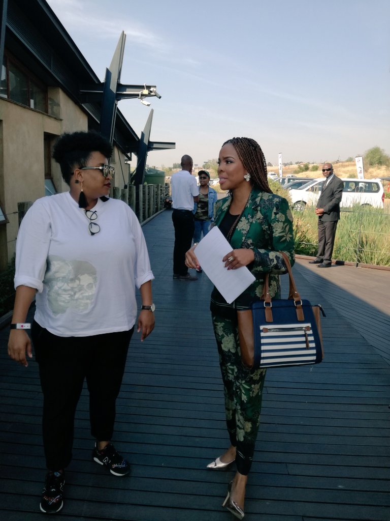 TamboFoundation's tweet photo. Programme Director @MasechabaNdlovu arrives. Chatting to @TamboFoundation Projects Manager, Natasha. #Tambo100 #TamboCoinLaunch https://t.co/xGNQtEjqXQ