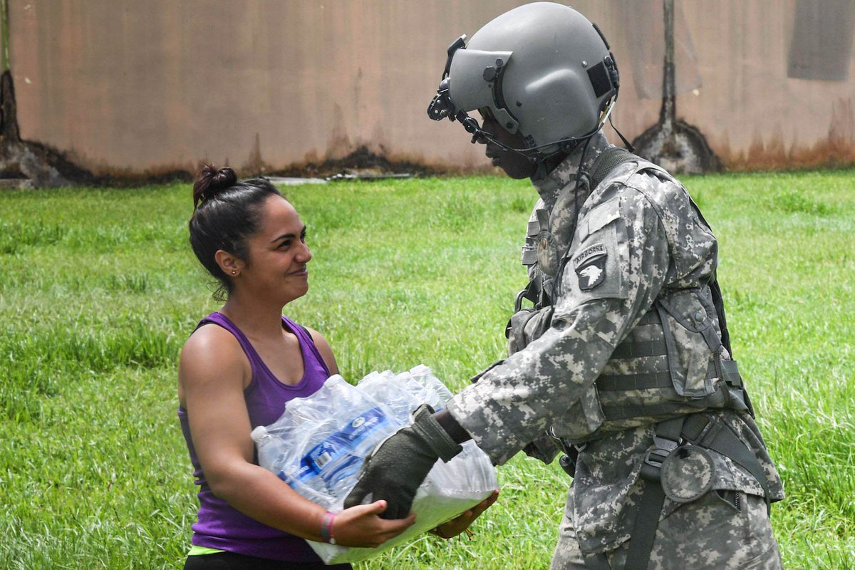 Water Handoff. A <a href="/USArmy/">U.S. Army</a> #soldier from <a href="/101CAB/">Wings of Destiny</a> <a href="/101stAASLTDIV/">101st Airborne Div.</a> delivers food and water by #UH60 to residents of #Orocovis, #PuertoRico.