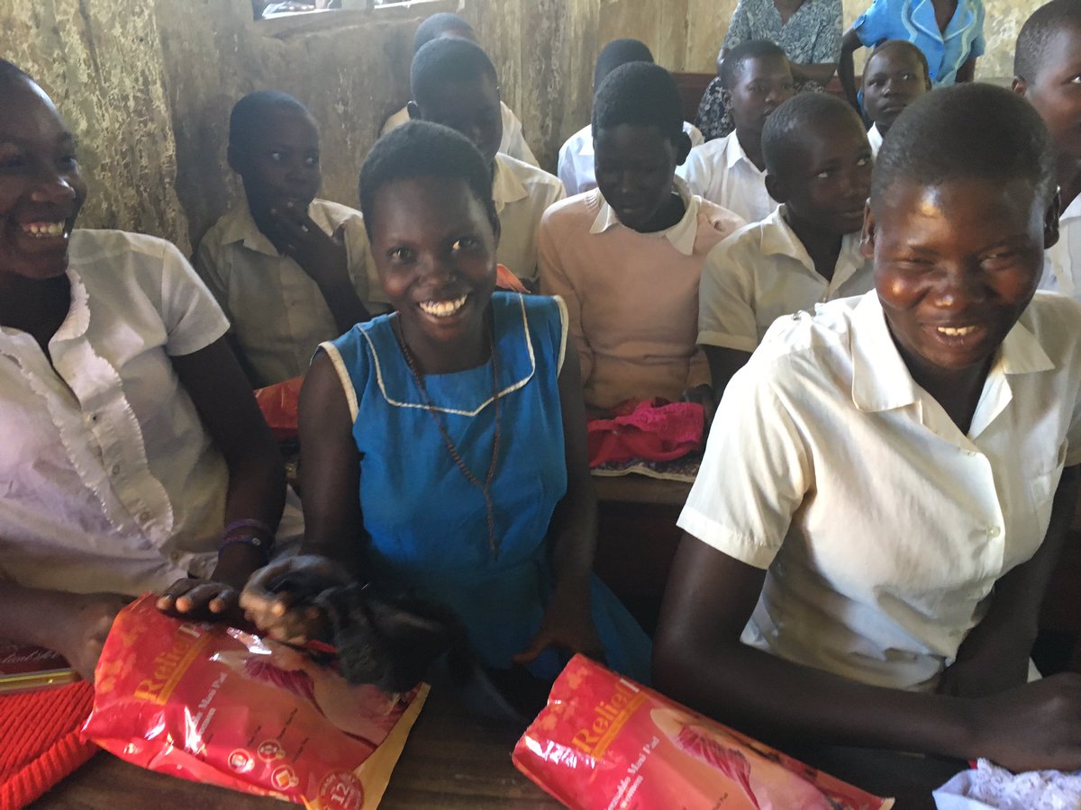Teams4u's tweet photo. Distributing re-usable sanitary pads this morning at Omatinga, giving Primary 5-7 girls comfort during their education #DevelopwithDignity https://t.co/ulJotHzp4P