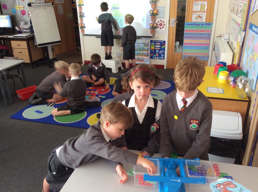 Year One enjoying some maths activities.