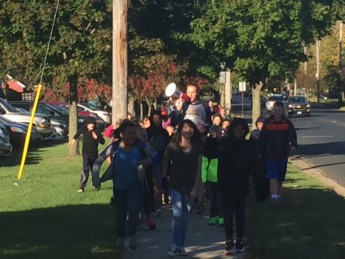 Mr.G and 200+ students participating  in Walk to School Day