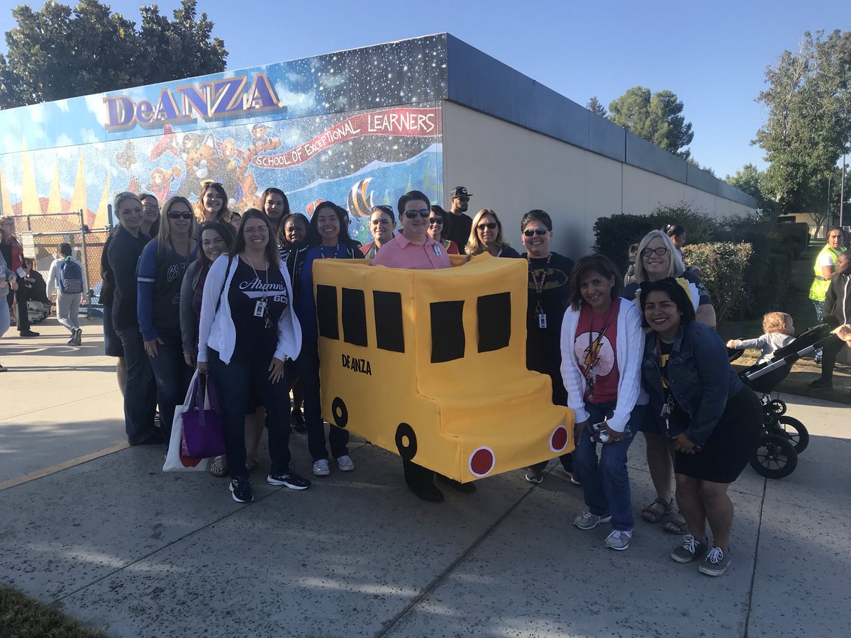 DeAnza staff and students loved the school bus leading them to school for Walk to School Day!