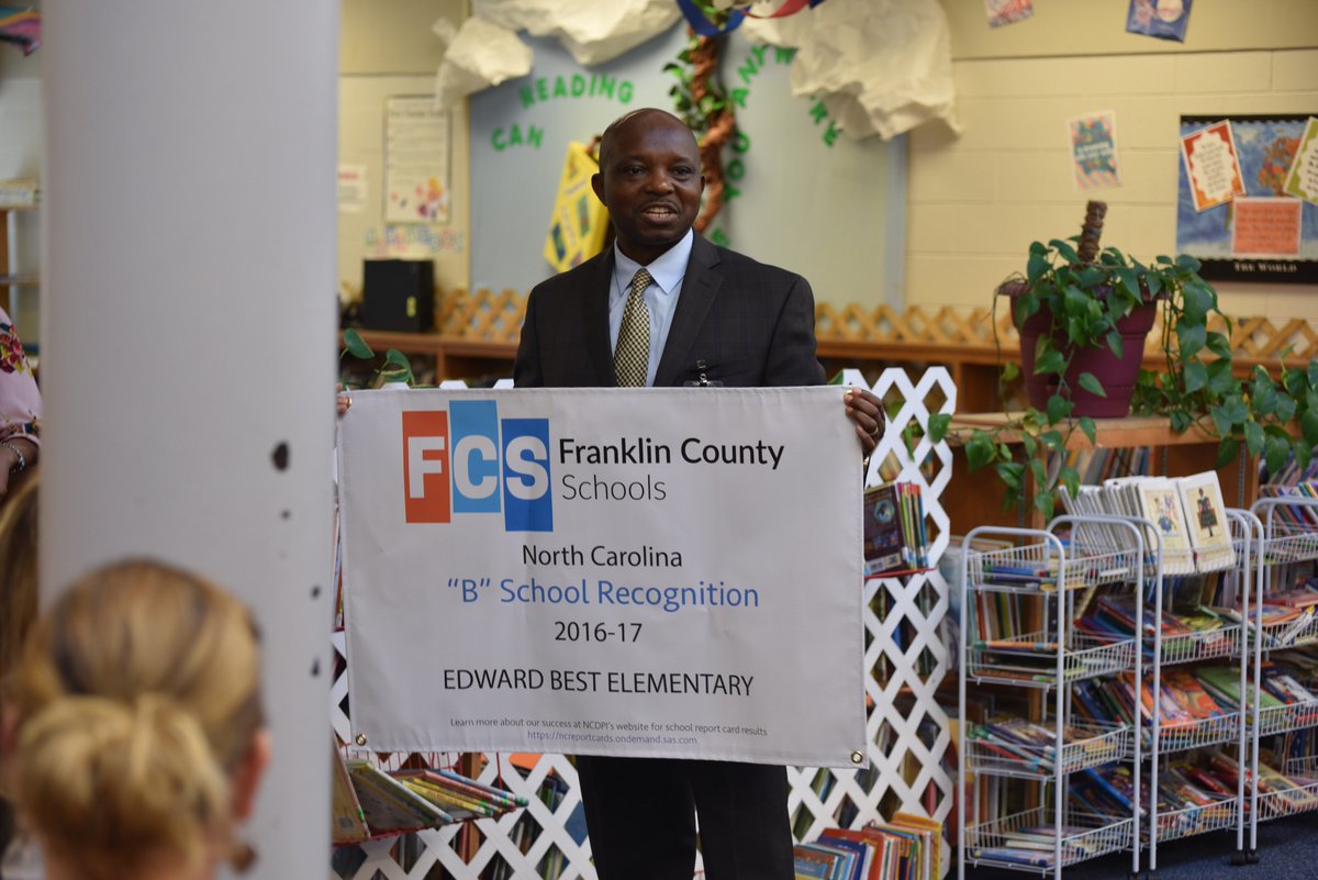 FCSchoolsNC's tweet photo. The staff @EdwardBestFCS were all smiles to receive a banner recognizing the "B" they received on their school report card. Congratulations! https://t.co/67KD8qF32S