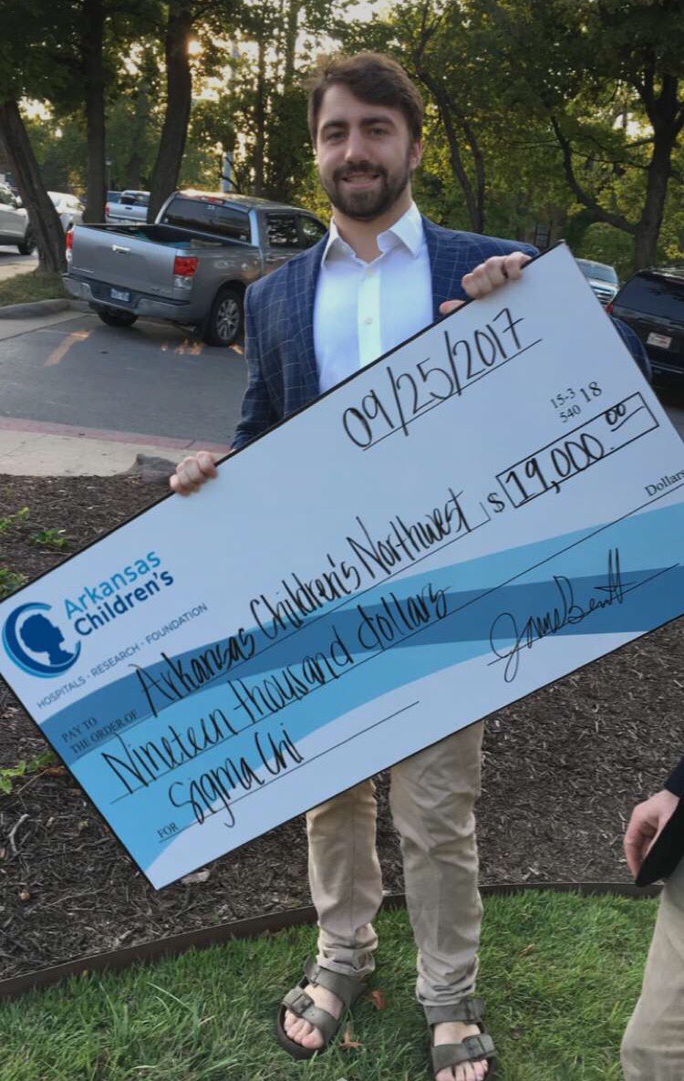UASigmaChi's tweet photo. Congrats to this week's Member of the Week James Bennett! Here he is with the $19,000 we raised for Arkansas Children's Hospital last fall! https://t.co/iXABkfsl9F