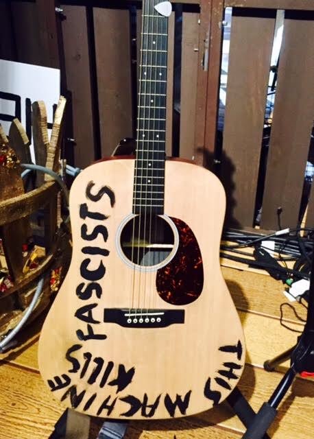 HoodMusical's tweet photo. Check out the awesome guitar we used in #Hood and its inspiration from #WoodyGuthrie 🎸 
#ThisMachineKillsTheFascists https://t.co/GL0XKTtRhW