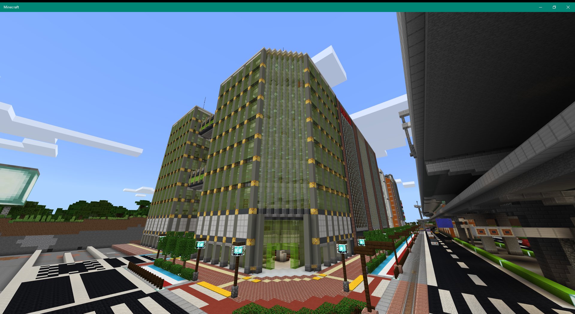 光楼市 Koro City Minecraftで都市開発 前の道が完成してませんが 初めて色ガラスを使った建物が完成しました マインクラフト 色ガラス