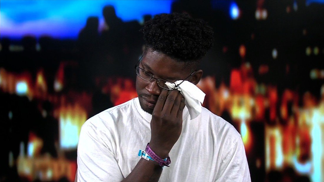 CNN's tweet photo. Hero who saved 30 people in Las Vegas shooting reunited with the off-duty officer who saved his life https://t.co/7i6ev3rM1n https://t.co/nSzFB2NSxI