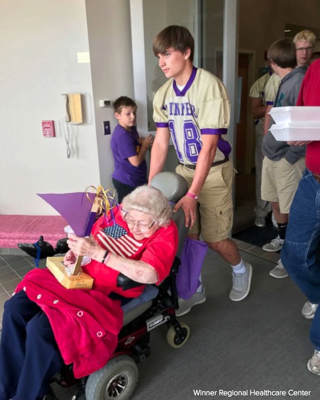 ABC's tweet image. South Dakota HS football players wheel elderly residents out to enjoy homecoming parade. "It’s monumental to them." abcn.ws/2xZIVyZ