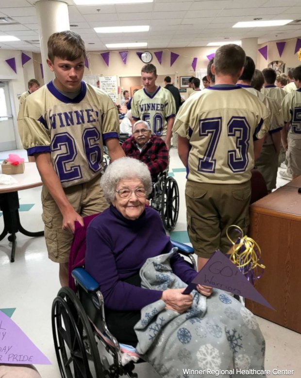 ABC's tweet image. South Dakota HS football players wheel elderly residents out to enjoy homecoming parade. "It’s monumental to them." abcn.ws/2xZIVyZ