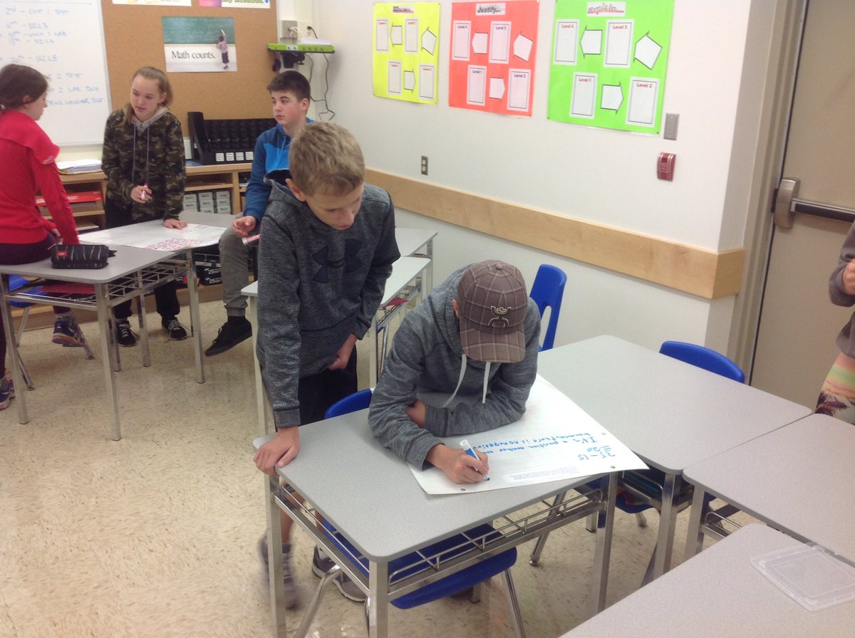 AgarMath's tweet photo. Today we were working on problems with integers. Groups rotated from station to station to finish the previous group's work. #integers https://t.co/nMdyH8BTft
