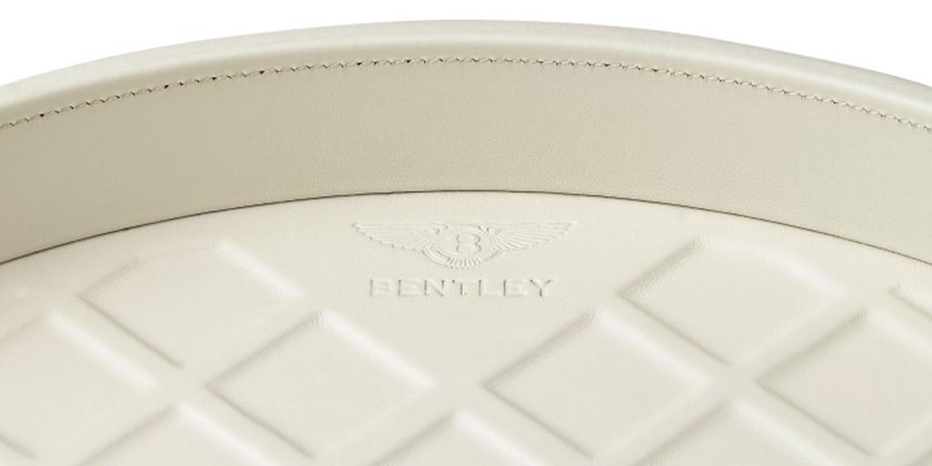 BentleyMotors's tweet photo. Featuring Bentley’s diamond quilt pattern, the leather tray and bottle holder is an elegant addition to any home: https://t.co/kLqwTccLG4 https://t.co/oNAveHZ99w