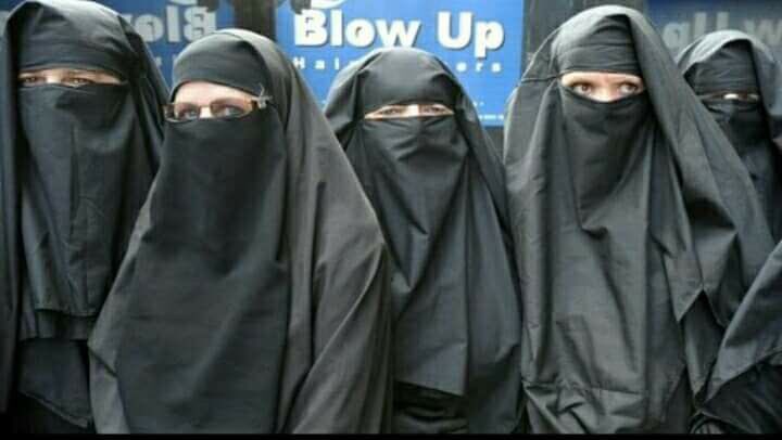 men?women? 
man pretending as woman with hijab made many attacks in past. 
Authorities should ban hijab if ur citizens don't get hurt.