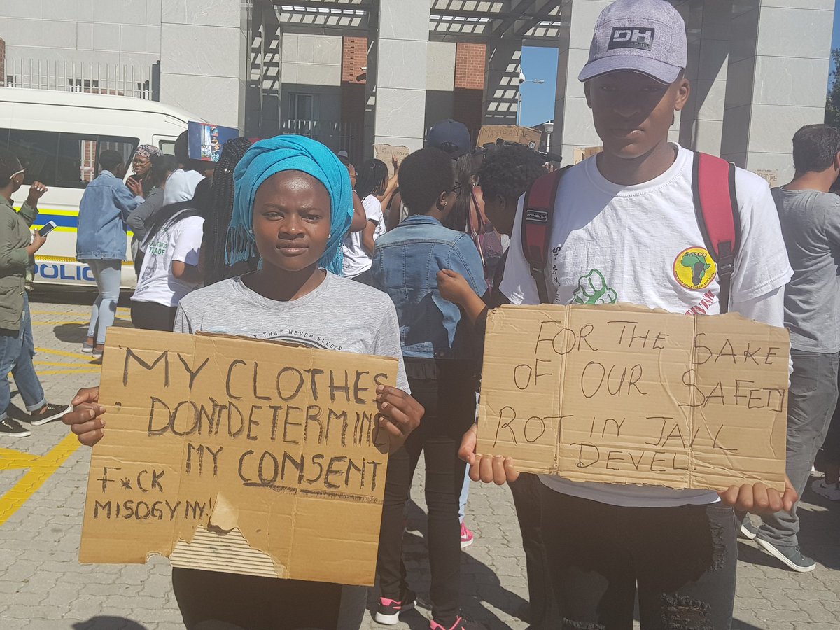 JayedLeigh's tweet photo. Students holding placards with strong messages. One reads: "My clothes dont determine my consent."

#Sabcnews #NMUattack https://t.co/n2XaSh05Yo