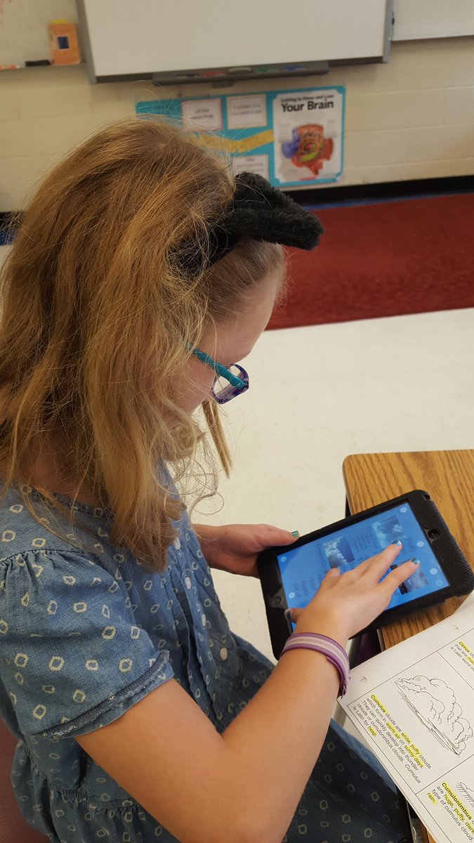 A beautiful day to learn about clouds! Students created PicCollages showcasing the different cloud types. #JGESlearns