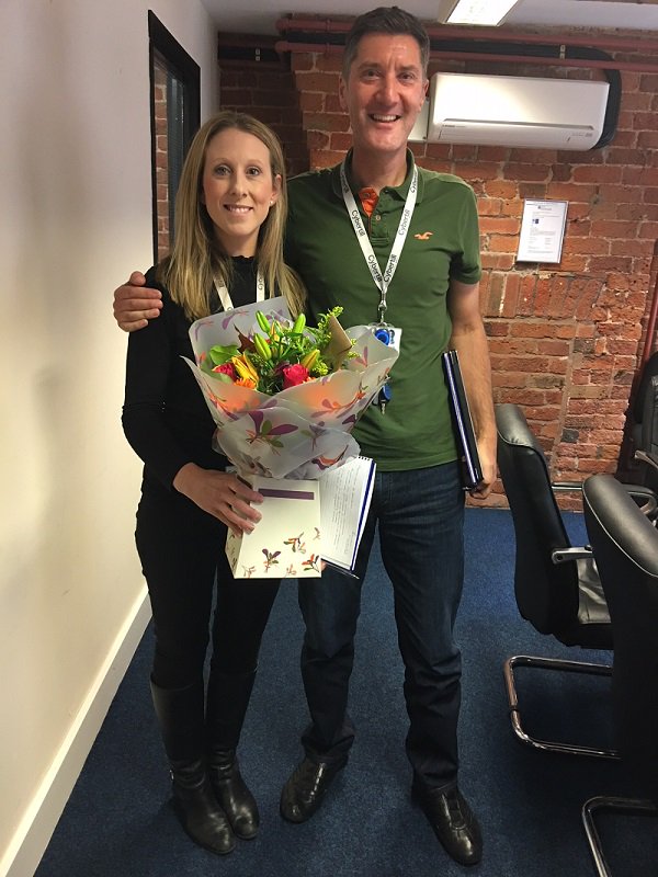 Tucodog's tweet photo. #NCSW2017 Lisa Weir takes delivery of her thank-you flowers @cybertill https://t.co/dXQD0KpShu
